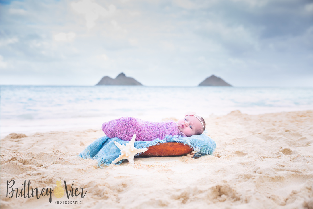 Oahu newborn photographer | newborn beach pose